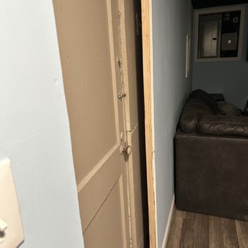 Kentucky Contracting Services - a view of a bedroom from the hallway - Drywall Installation & Repair Near Me