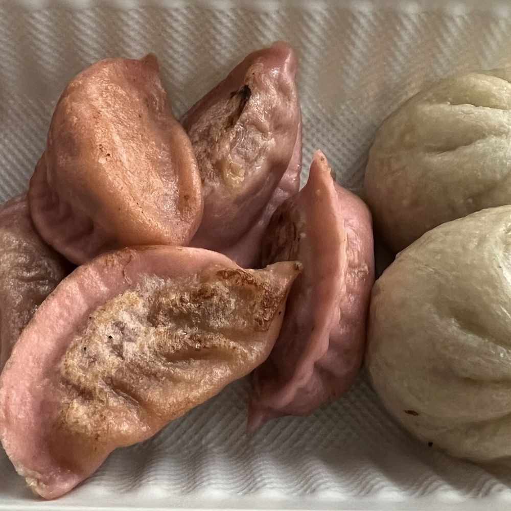 Left: pork and shrimp dumpling, right: pork buns Left: pork and shrimp dumpling, right: pork buns