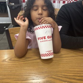 Five Guys - My daughter enjoying her drink - Burgers Near Me - Harahan, Louisiana Five Guys - My daughter enjoying her drink - Burgers Near Me - Harahan, Louisiana