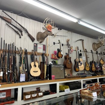 Ace Pawn Shop - More of everything Mercilessness and Musical all on one wall, oh, and more animal heads. - Pawn Shops Near Me - Bloomington, Indiana Ace Pawn Shop - More of everything Mercilessness and Musical all on one wall, oh, and more animal heads. - Pawn Shops Near Me - Bloomington, Indiana