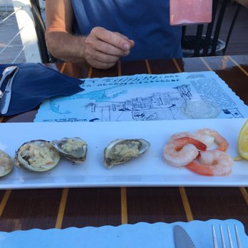 Shuckers - Four stars due to a ten dollar share charge. The food was ok. The lobster meal was $26, apps $13, drinks $8. - Seafood Near Me - Woods Hole, Massachusetts Shuckers - Four stars due to a ten dollar share charge. The food was ok. The lobster meal was $26, apps $13, drinks $8. - Seafood Near Me - Woods Hole, Massachusetts