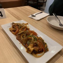 a plate of food on a table a plate of food on a table