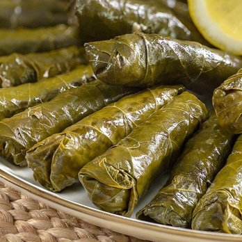 Ozfeka Catering - Hand wrapped special recipe vegetarian Sarma ( Stuffed Grape Leaves) - Caterers Near Me - Arlington, Virginia Ozfeka Catering - Hand wrapped special recipe vegetarian Sarma ( Stuffed Grape Leaves) - Caterers Near Me - Arlington, Virginia