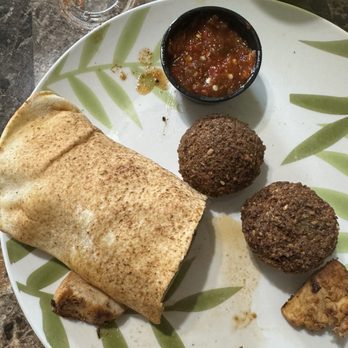 Yafa Grill - 1/2 of my DELICIOUS chicken kebab sandwich with their hot sauce & falafels!! - Mediterranean Near Me - Fresno, California Yafa Grill - 1/2 of my DELICIOUS chicken kebab sandwich with their hot sauce & falafels!! - Mediterranean Near Me - Fresno, California