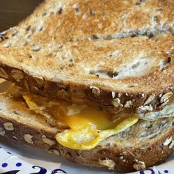 Kelly’s Coffee House - Spring Green - Egg and Cheese on multigrain bread