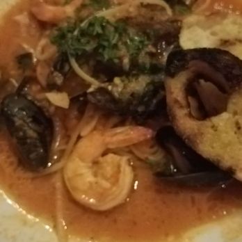 Carbone's Prime - Cioppino with shrimp, lobster, and mussels over pasta with two crostini slices - Steakhouses Near Me - Rocky Hill, Connecticut Carbone's Prime - Cioppino with shrimp, lobster, and mussels over pasta with two crostini slices - Steakhouses Near Me - Rocky Hill, Connecticut