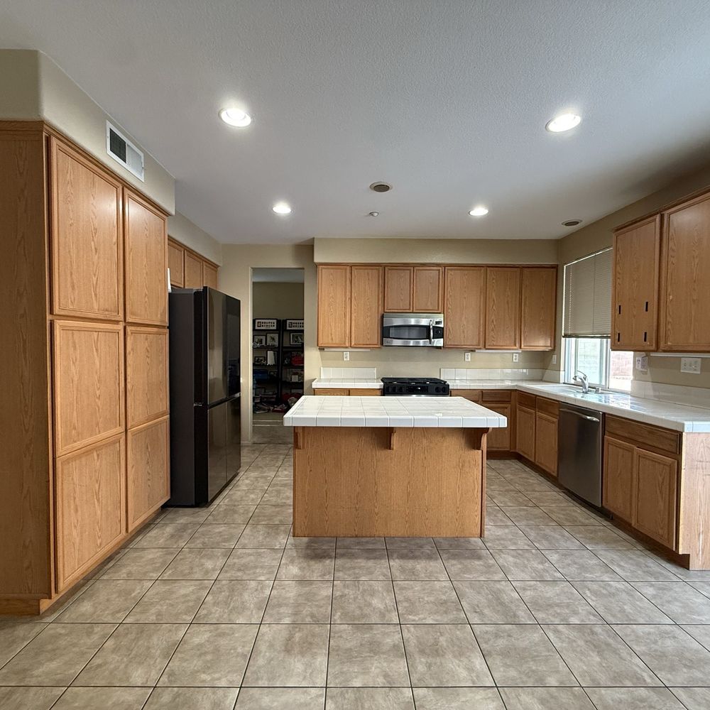 Gramoscabinets - Pantry on the left felt so heavy and the cabinets hanging on the right darkened the room - Cabinetry Near Me - Fontana, California