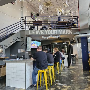 Three Notch'd Craft Kitchen and Brewery - Roanoke - The view as I entered the restaurant with the inspirational sign high above. - Breweries Near Me - Roanoke, Virginia