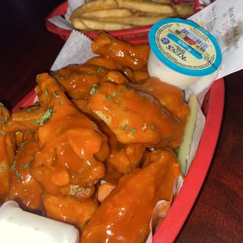 Picassos - a tray of chicken wings and french fries - Seafood Near Me - Memphis, Tennessee