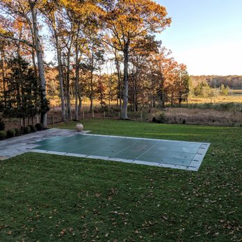 Anchor Pools - New custom Loop-Loc safety cover installation on this 16x36 pool we service and maintain in North Haven - Pool & Hot Tub Service Near Me