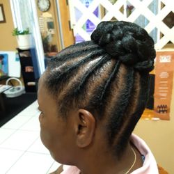 Flat twist updo with a braid