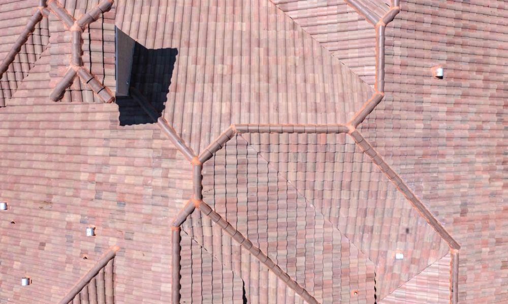 Slide of Academia Roofing & Solar