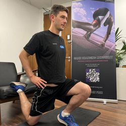 MY Sports Injury ® | Chiropractic - Ahmed physiotherapist prescribing exercises for self management after the session at my sports injury