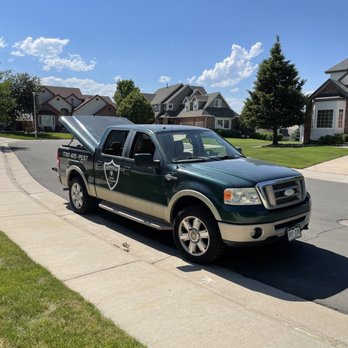 Konold Pest Control - Work truck with company logo and contact information - Pest Control Near Me - Denver, Colorado Konold Pest Control - Work truck with company logo and contact information - Pest Control Near Me - Denver, Colorado