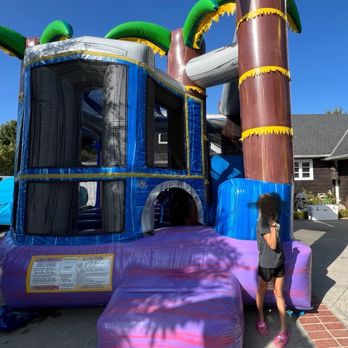 OC Bouncers - Tropical basketball court with slide. - Bounce House Rentals Near Me