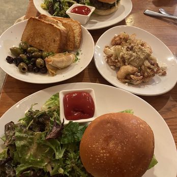 Aracely Cafe - Burger, House Salad, warm olives with roasted garlic and roasted cauliflower with hummus - New American Near Me - San Francisco, California