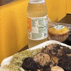 Ziggy’s Caribbean Cuisine - Jerk chicken with rice and peas with steamed cabbage.
