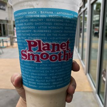 Planet Smoothie - a hand holding a cup of smoothie - Juice Bars & Smoothies Near Me - Daytona Beach, Florida Planet Smoothie - a hand holding a cup of smoothie - Juice Bars & Smoothies Near Me - Daytona Beach, Florida