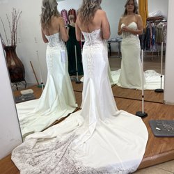 David's Tailoring Express - Wedding dress alterations.