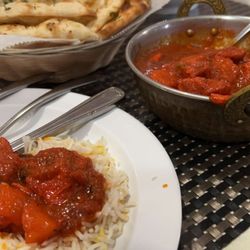 Rose Garden Indian Cuisine - Chicken vindaloo, garlic naan, basmati rice.