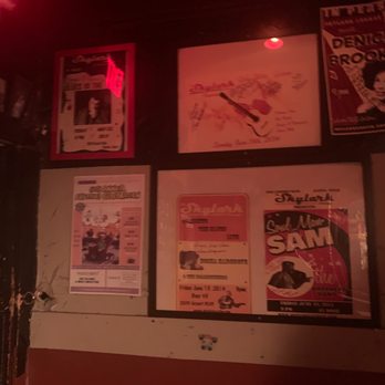 Skylark Lounge - a wall full of posters - Dive Bars Near Me - Austin, Texas