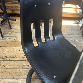 School House Kitchen & Libations - Old school chair - New American Near Me - Arvada, Colorado