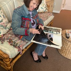 CMS Primary Home Healthcare - Looking over family photos.
