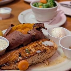 Texas Roadhouse - Grilled salmon with sweet potato and fresh vegetables