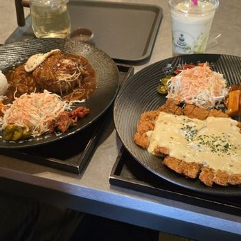 Cafe Mixx - Honey butter hamburger patty and carbonara pork katsu. Tteok and sausage skewer to the right. - Cafeteria Near Me - Suwanee, Georgia Cafe Mixx - Honey butter hamburger patty and carbonara pork katsu. Tteok and sausage skewer to the right. - Cafeteria Near Me - Suwanee, Georgia