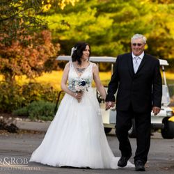 Heather & Rob Wedding Photography - Every dad can feel this photo. Bryanne looks adoringly at her father as they arrive at the ceremony.