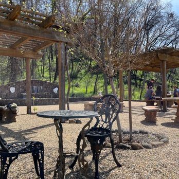 Platypus Wine Tours - Paoletti winery outdoor tasting area. - Wineries Near Me - Napa, California