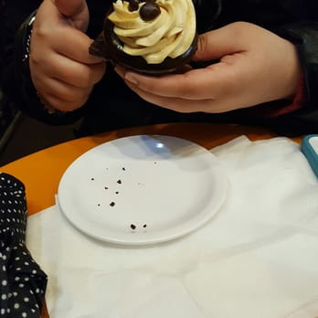 Molly's Cupcakes - Cappuccino cupcake with coffee beans on top. - Desserts Near Me - Chicago, Illinois Molly's Cupcakes - Cappuccino cupcake with coffee beans on top. - Desserts Near Me - Chicago, Illinois