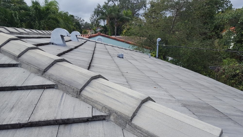 Slide of TNT Roofing