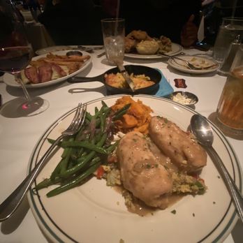 Grace's - Sausage stuffed chicken over cornbread dressing with green beans and sweet potatoes/yams - American Near Me - Houston, Texas Grace's - Sausage stuffed chicken over cornbread dressing with green beans and sweet potatoes/yams - American Near Me - Houston, Texas