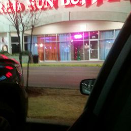 About to head into eat at Red Sun with my friends Josh & Trish