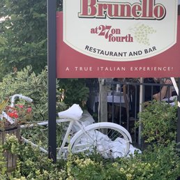 a sign for a restaurant and bar a sign for a restaurant and bar