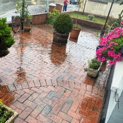 Telstar Hotel - The patio out in front of the hotel during a rainstorm. Loved the flowers and brickwork. Wish I'd taken more photos inside. Maybe next time.