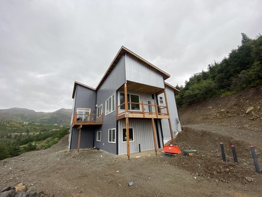 Three Nails Services Logo