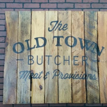 Old Town Butcher - a wooden sign on a brick wall - Meat Shops Near Me - DeLand, Florida Old Town Butcher - a wooden sign on a brick wall - Meat Shops Near Me - DeLand, Florida