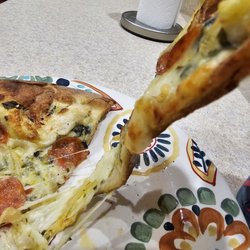 Cap's Pizza - Raw dough sadness. Paper thin. Wet.