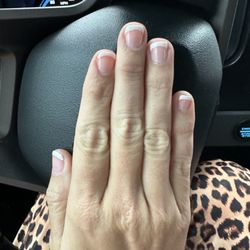 French manicure, uneven and nails in bad shape from too much skin pulling