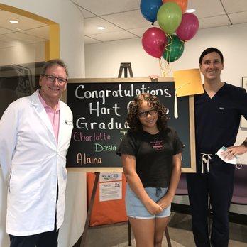 Hart Orthodontics - The drs and the happy patient - Orthodontists Near Me - Woodbridge, Virginia