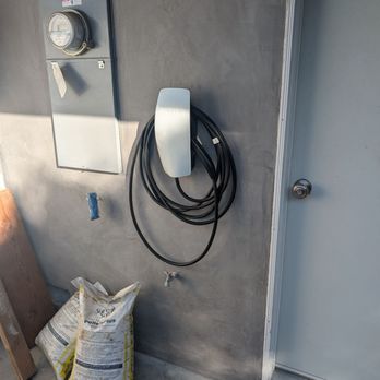 Tesla Electrical Services - Tesla wall connector/charger - Electricians Near Me