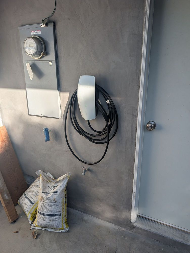 Slide of Tesla Electrical Services