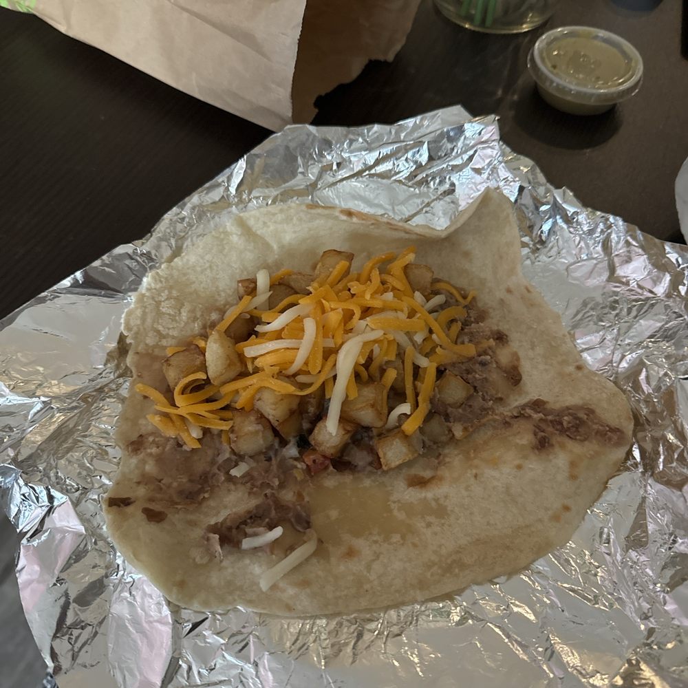 Laredo Taco Company - $8 for two of these tacos because she didn't wanna sub the egg for potatoes, or charge me a normal add on - Gas Stations Near Me - College Station, Texas