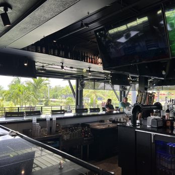 PopStroke - Bar area - Mini Golf Near Me - Fort Myers, Florida PopStroke - Bar area - Mini Golf Near Me - Fort Myers, Florida