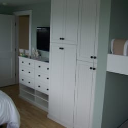Expert Closets - In room drawers and hanging area!