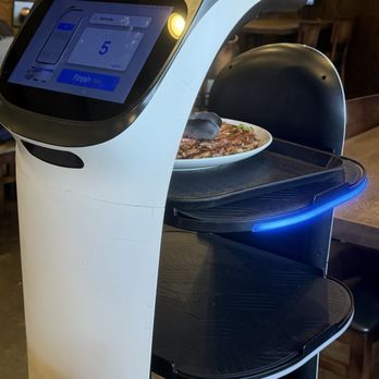 Kaju Soft Tofu - Kitty robot delivering food to the table - Korean Near Me - Buena Park, California Kaju Soft Tofu - Kitty robot delivering food to the table - Korean Near Me - Buena Park, California