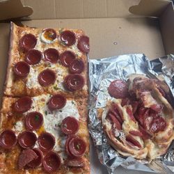 Pepperoni hot honey pizza on left and partly eaten pepperoni roll on the right (I couldn't resist )