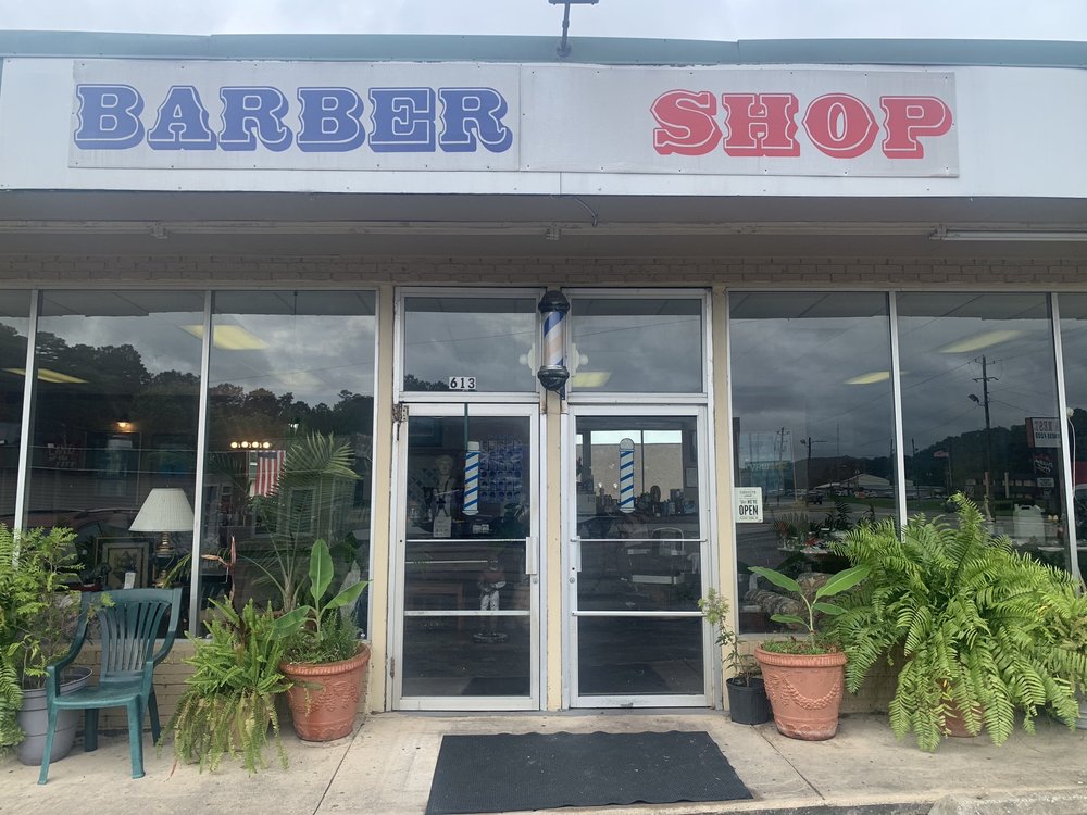 The Barber Shop of Oneonta Logo